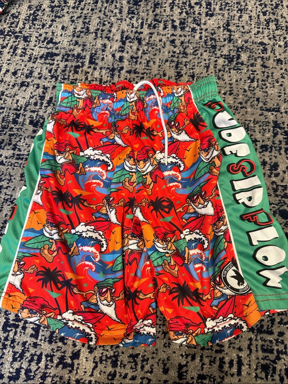 Kids' Red Tropical Print Athletic Shorts with Side Panel Branding